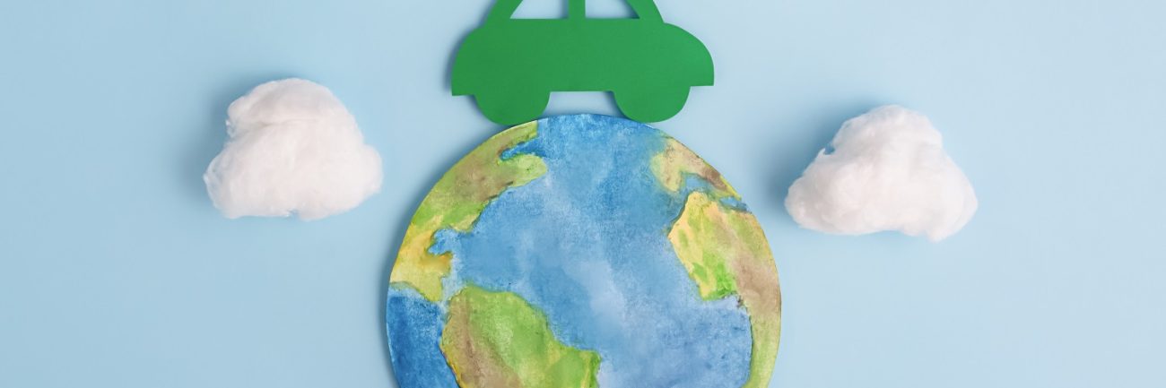 Green car and planet earth. Ecological transport. Ecology concept. Green car and planet earth. Ecological transport. Ecology concept.