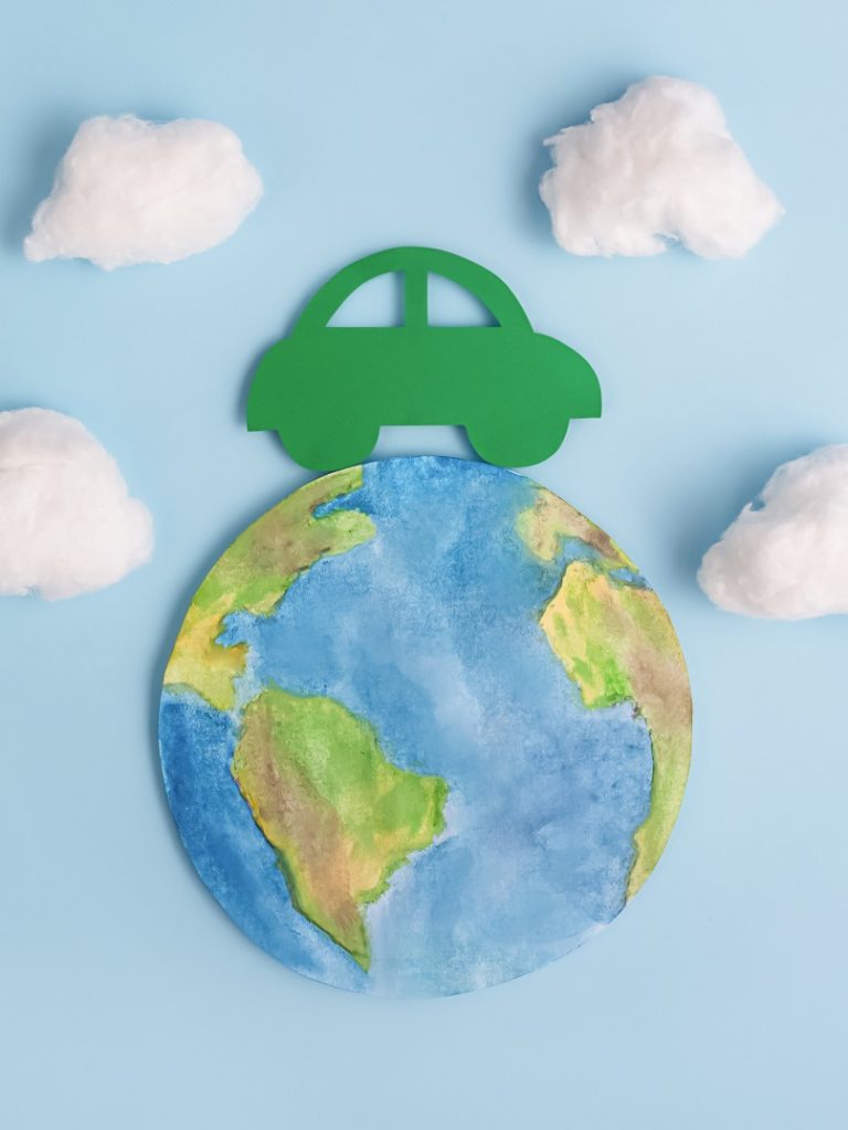 Green car and planet earth. Ecological transport. Ecology concept. Green car and planet earth. Ecological transport. Ecology concept.