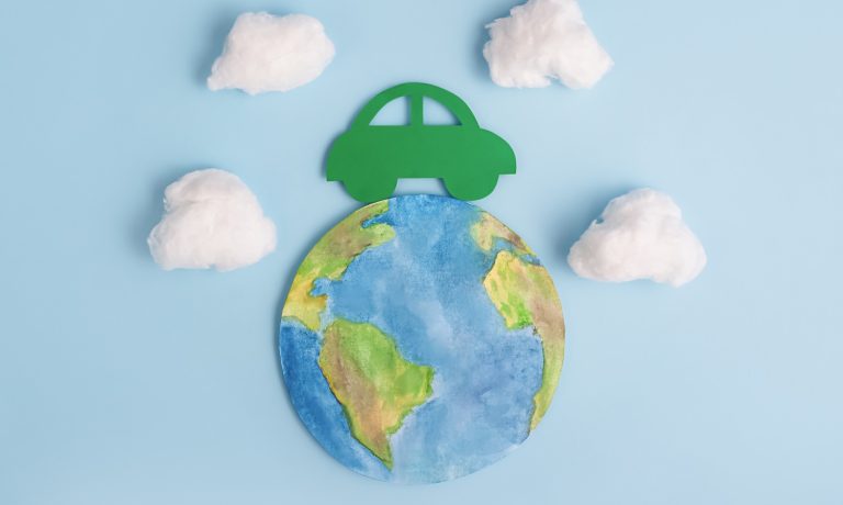 Green car and planet earth. Ecological transport. Ecology concept. Green car and planet earth. Ecological transport. Ecology concept.