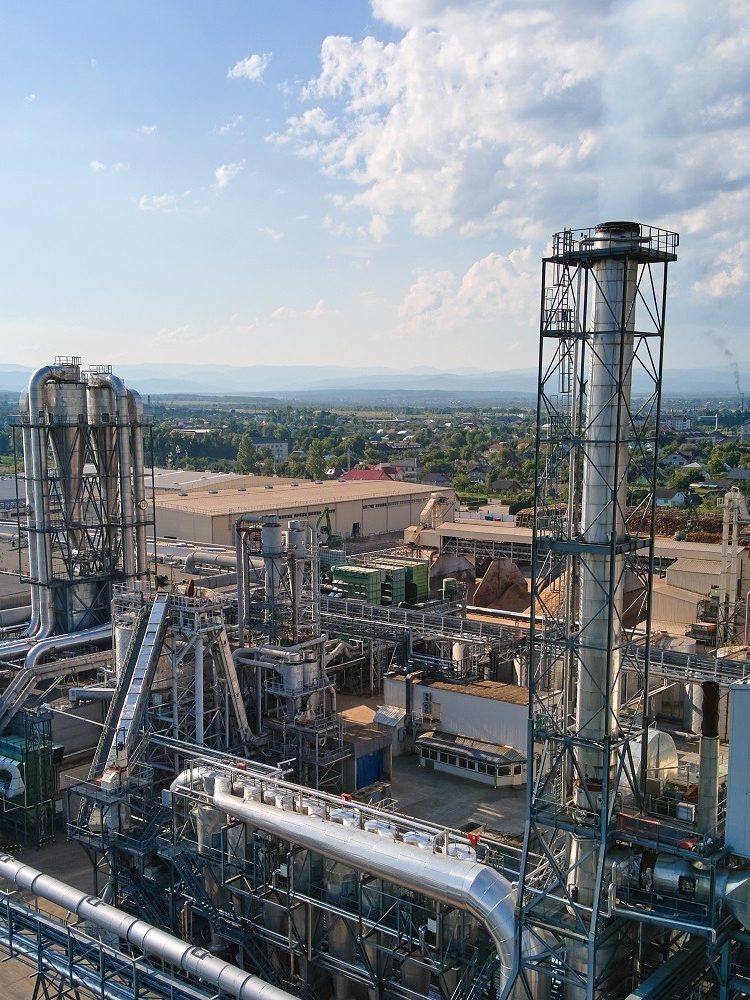 Aerial view of oil and gas refining petrochemical factory with tall refinery plant manufacture structure. Aerial view of oil and gas refining petrochemical factory with tall refinery plant manufacture structure.