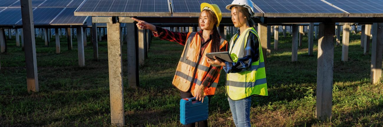 2 maintenance girl engineer carry tool box routine maintenance at greenery solar farm in village