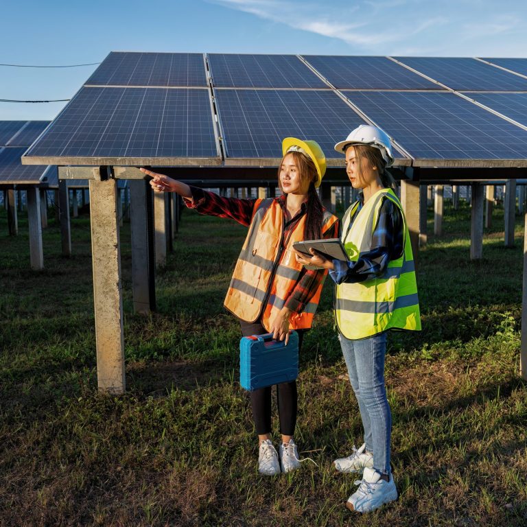 2 maintenance girl engineer carry tool box routine maintenance at greenery solar farm in village