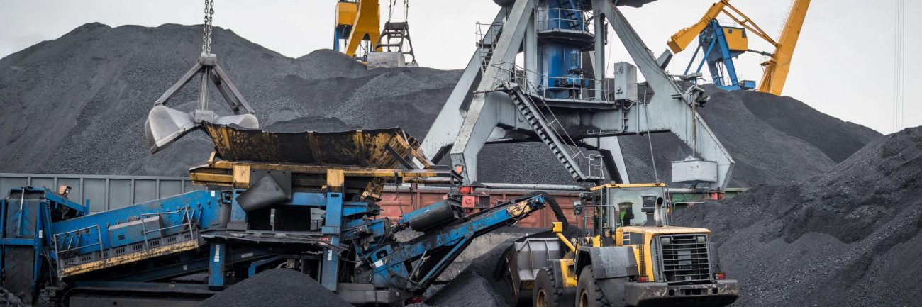 Work in port coal handling terminal.