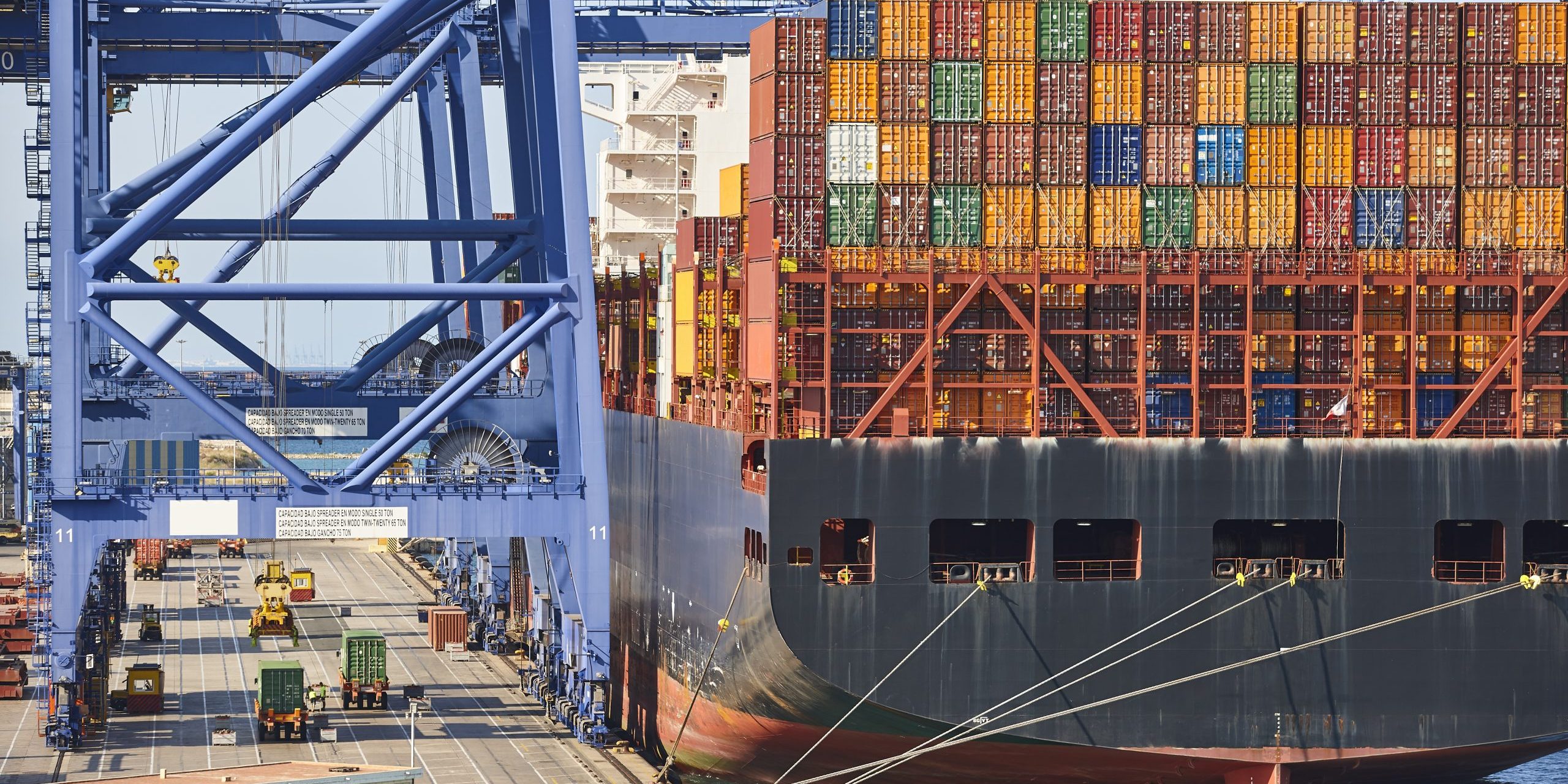 Containers on a vessel. Global market. Cargo shipping. Logistic