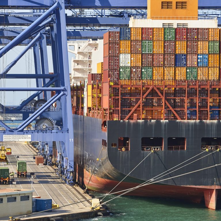 Containers on a vessel. Global market. Cargo shipping. Logistic