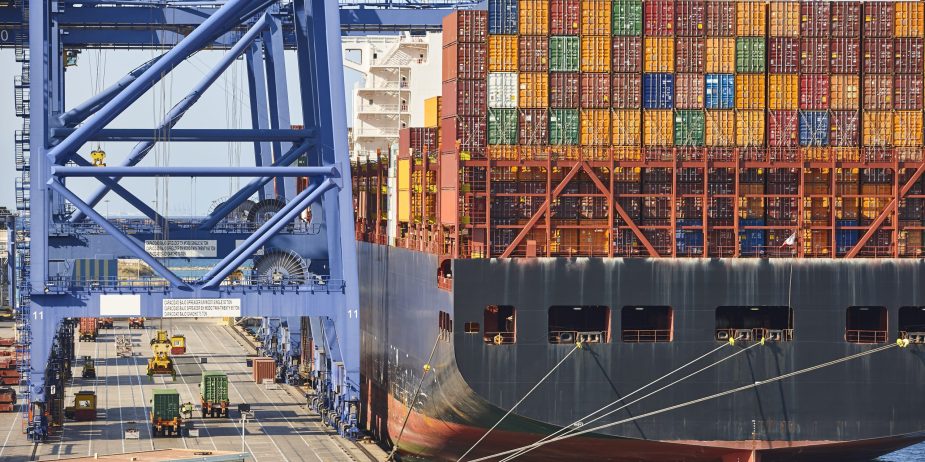 Containers on a vessel. Global market. Cargo shipping. Logistic
