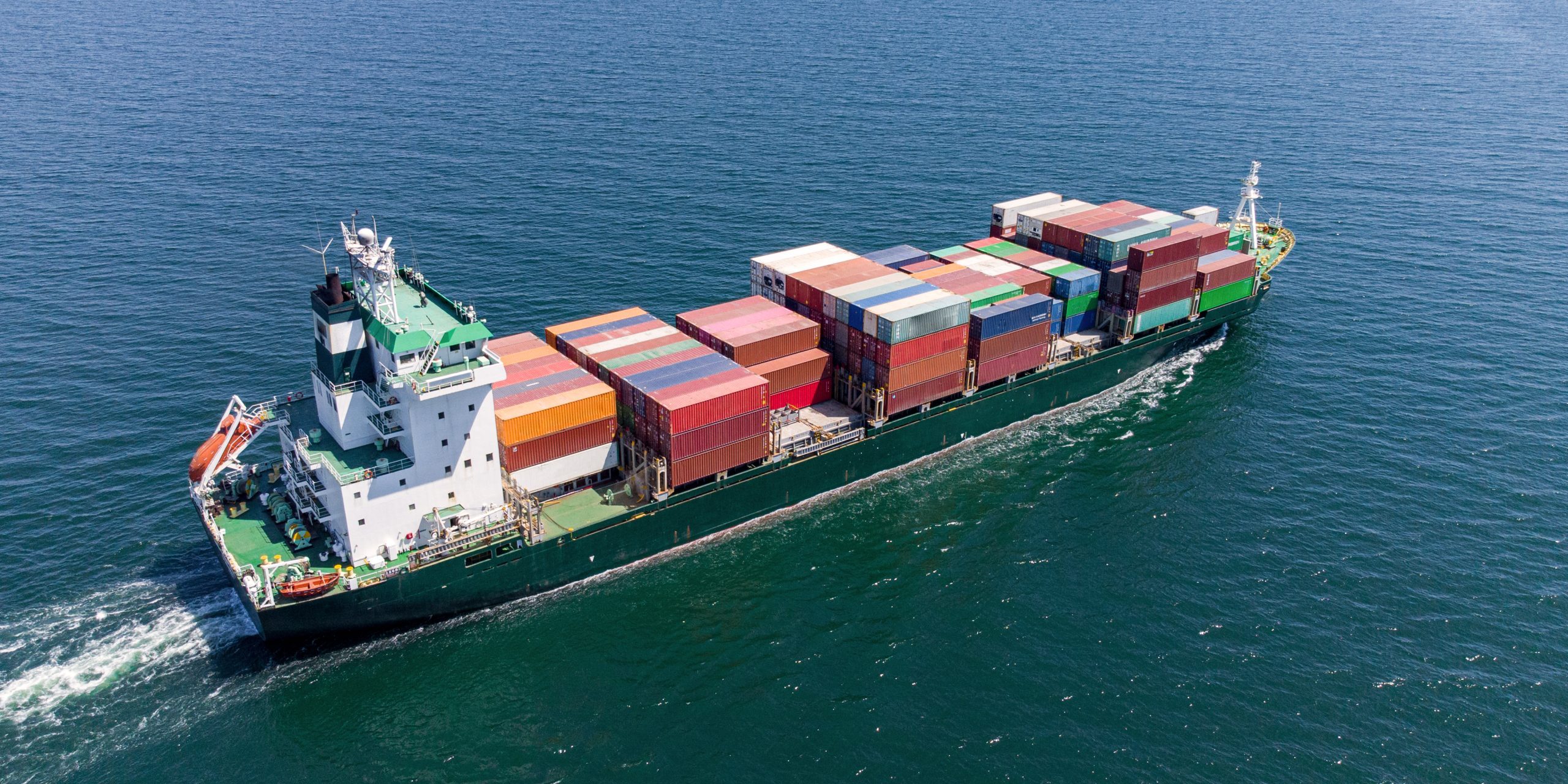 Aerial top view container ship, shipping or transportation concept background.