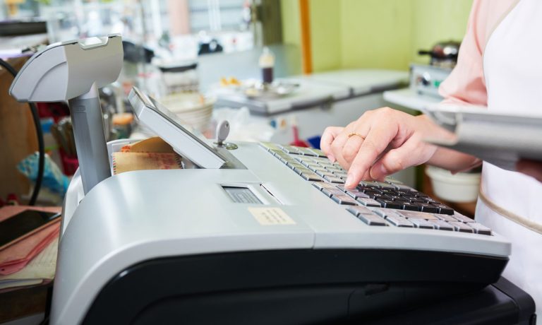 Working at cash desk