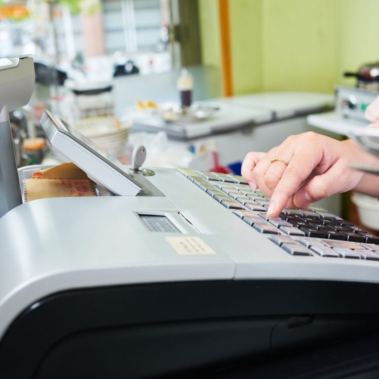 Working at cash desk