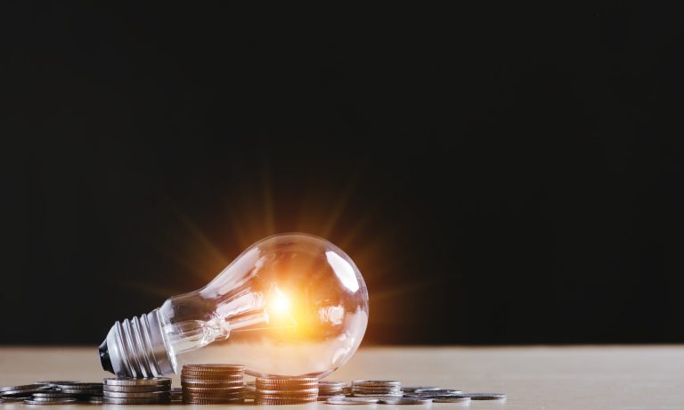 New idea concept with coins stack save power to save the earth,