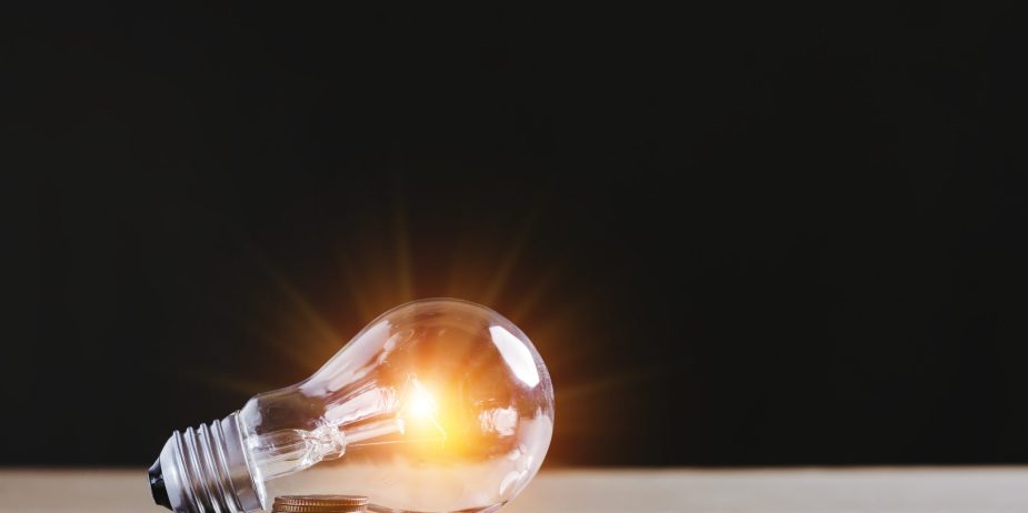 New idea concept with coins stack save power to save the earth,