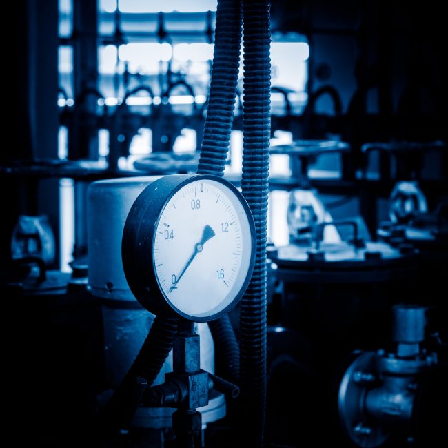 steel pipelines and cables in a plant