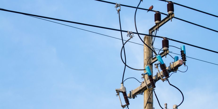 electric pole power with blue sky background