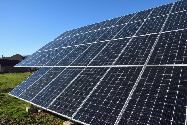 Solar panels against blue sky background.Against The Deep Blue Sky in suny weather