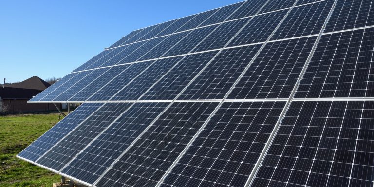 Solar panels against blue sky background.Against The Deep Blue Sky in suny weather
