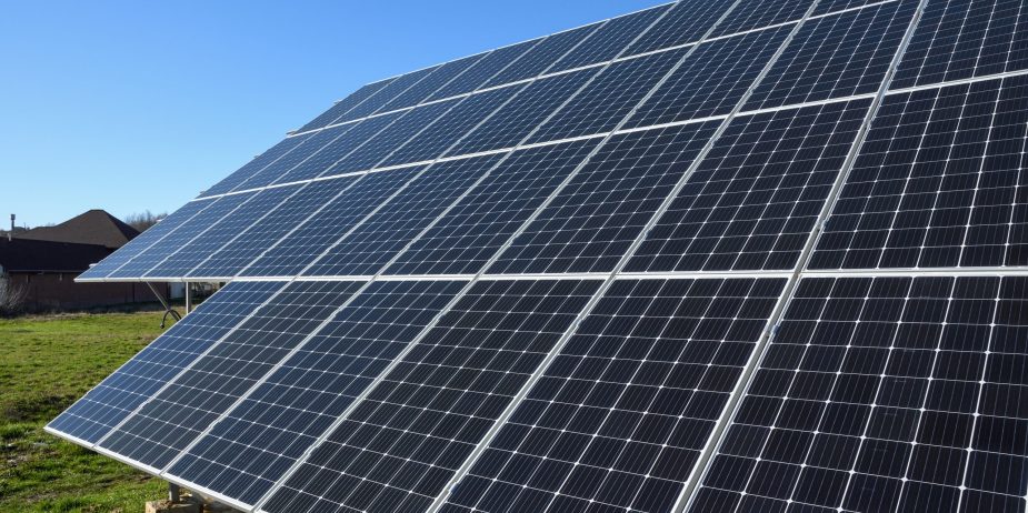 Solar panels against blue sky background.Against The Deep Blue Sky in suny weather