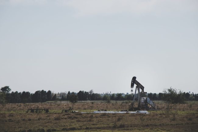 Oil drill in an empty field