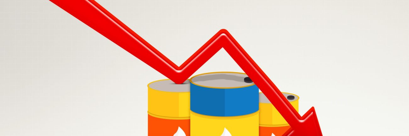 Declining red arrow with three oil drums on studio