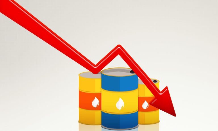 Declining red arrow with three oil drums on studio