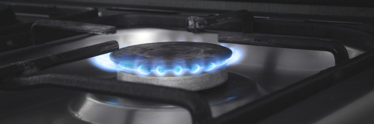 Gas burner with a burning fire. Kitchen gas