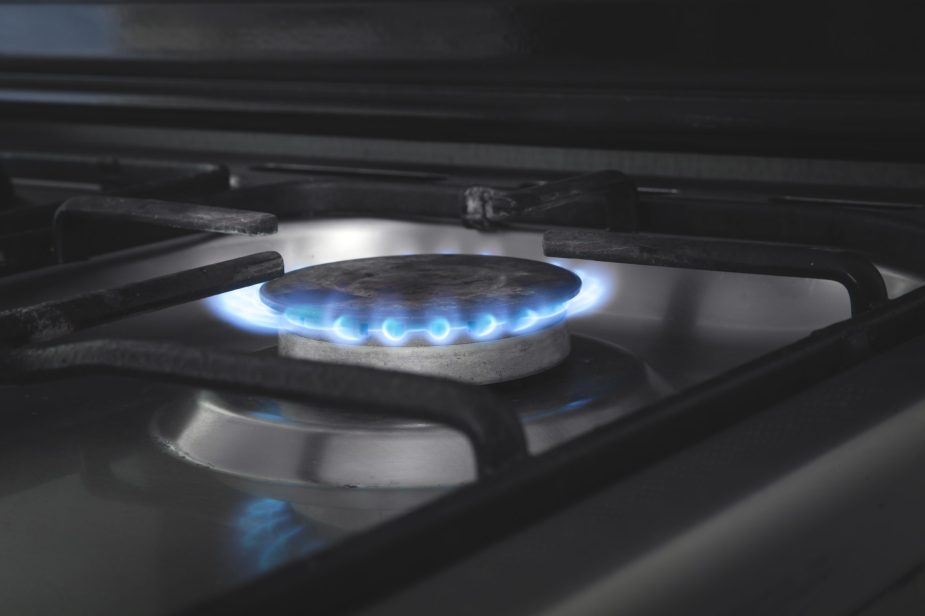 Gas burner with a burning fire. Kitchen gas