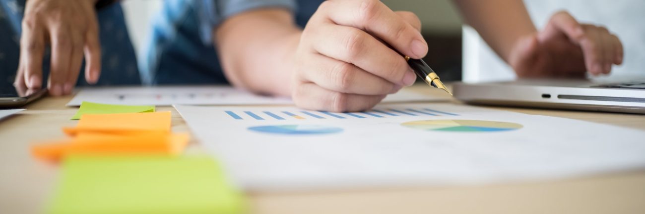 Business team working on a new business plan with modern digital