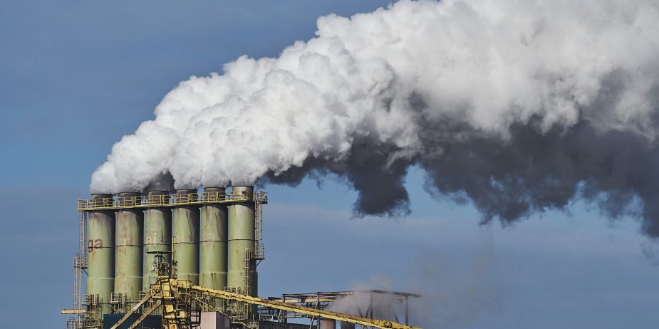 Smoke coming out of factories in an industrial area