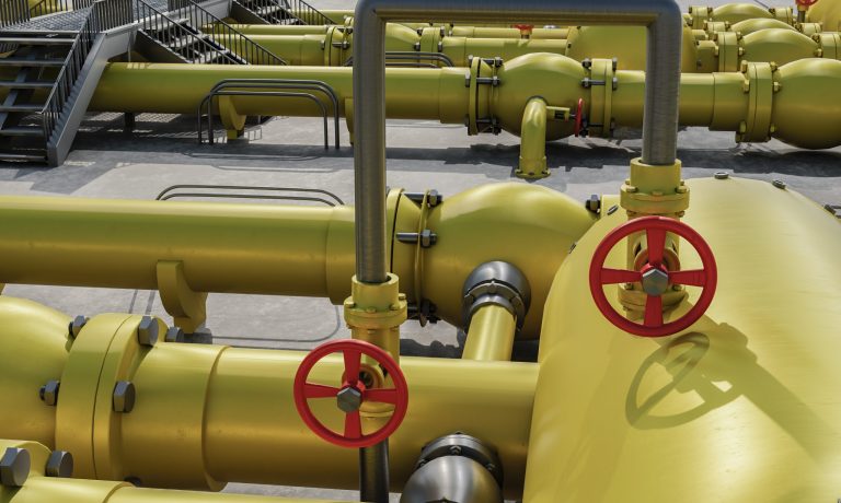 yellow-pipes-with-red-valves-arrangement