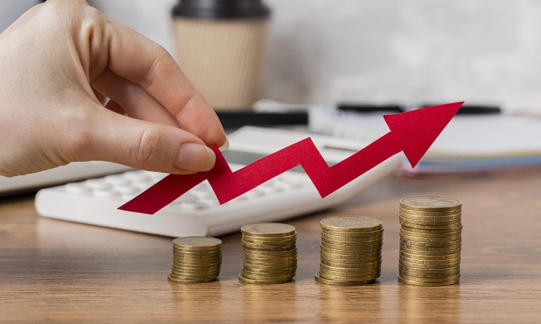 hand-holding-growth-arrow-with-coins