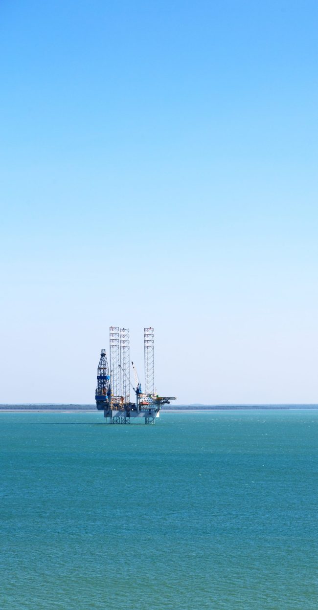 an off shore platform in the clear ocean