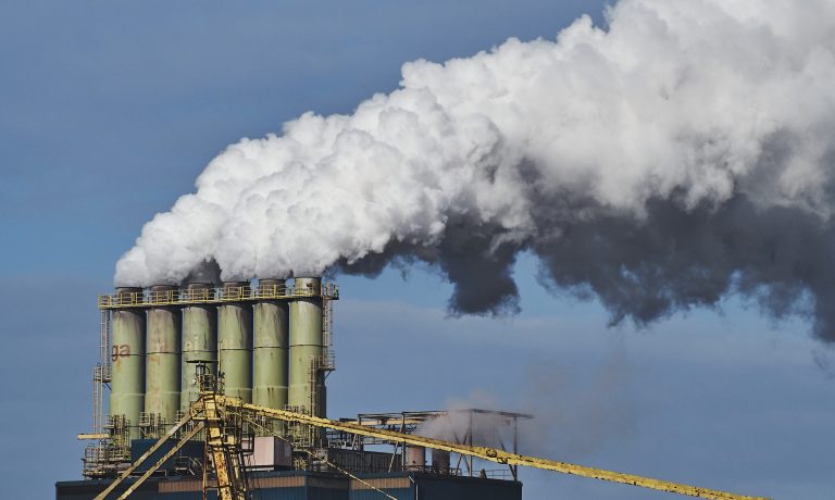 Smoke coming out of factories in an industrial area