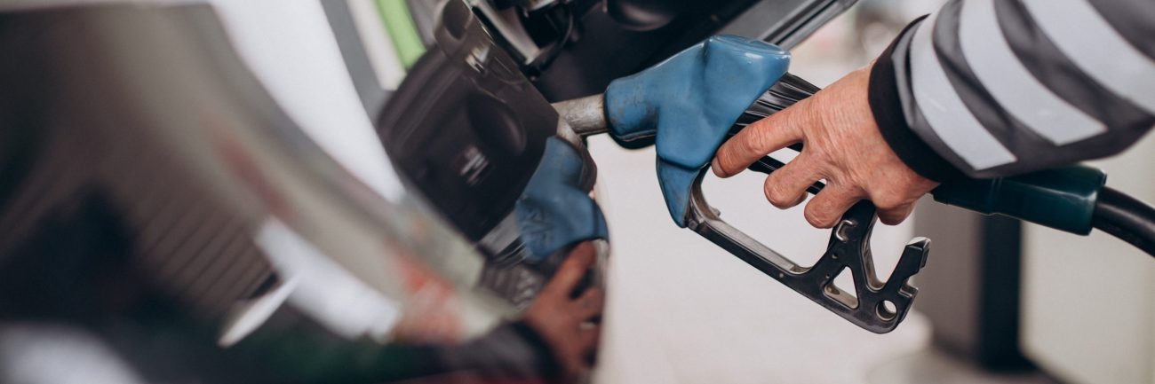 Car refueling at fuel station