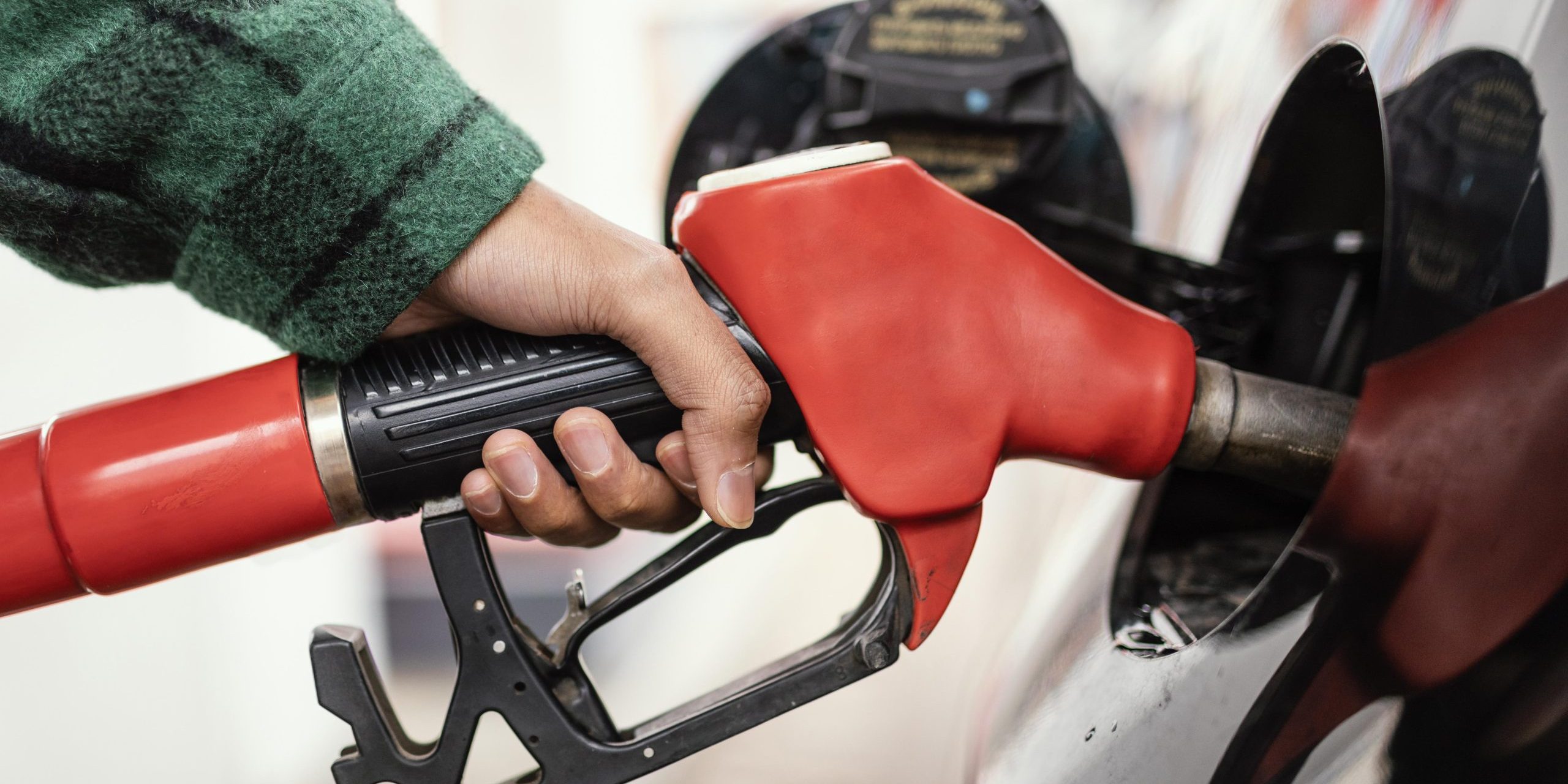 man-gas-station-with-car-close-up